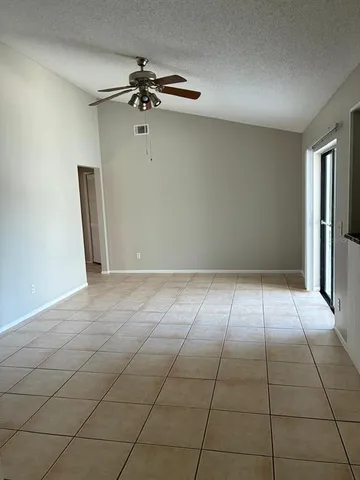 a view of a livingroom with a staircase