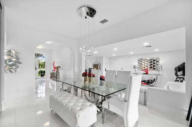 a view of a living room and dining room