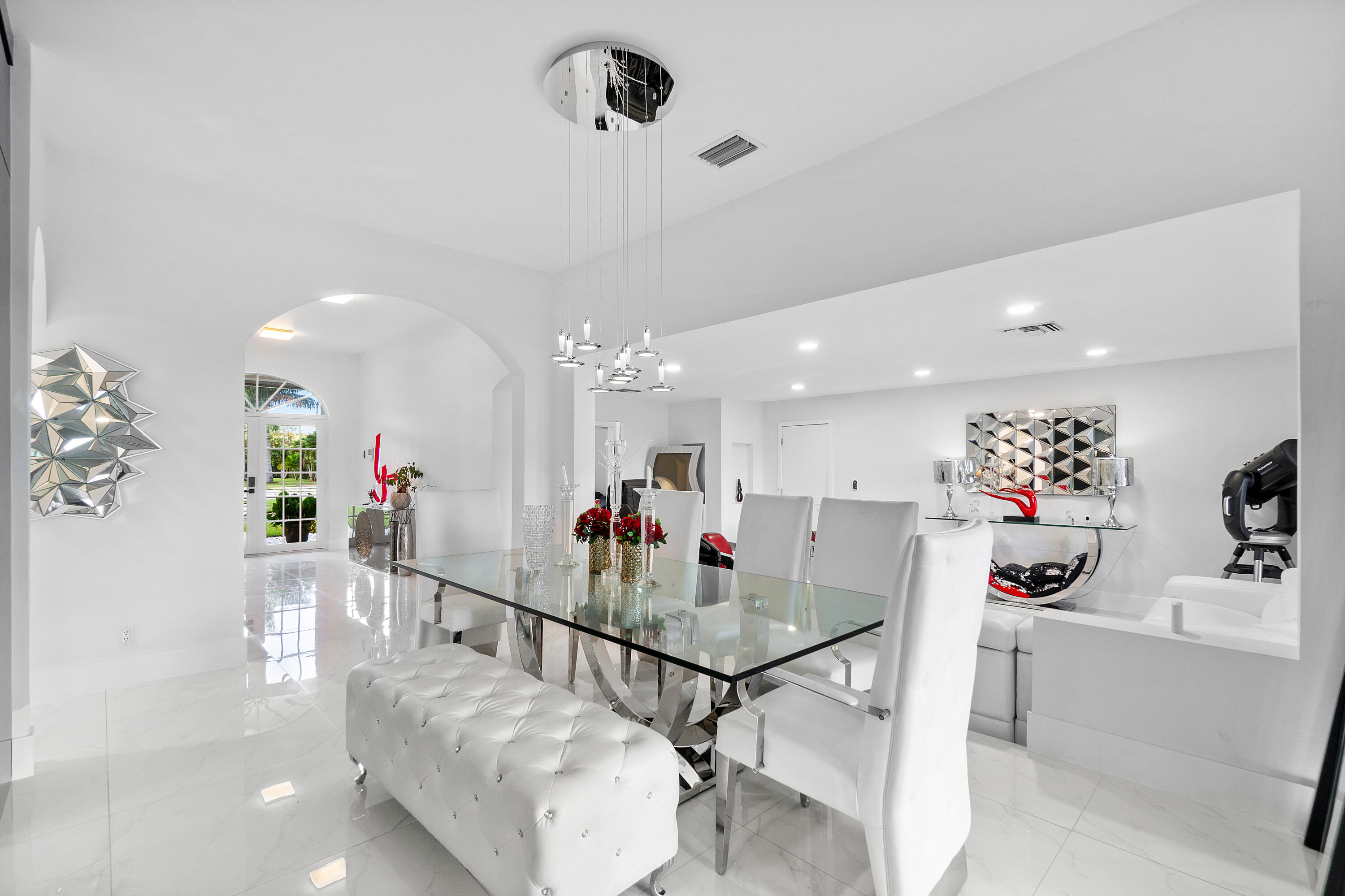 5447 Center Street Jupiter, FL 33458 - Photo 11 of 60 a view of a living room and dining room
