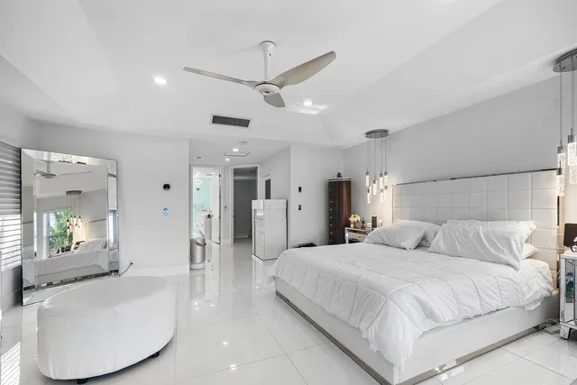 a view of a patio with a table and chairs