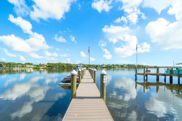a view of a lake with a car parked