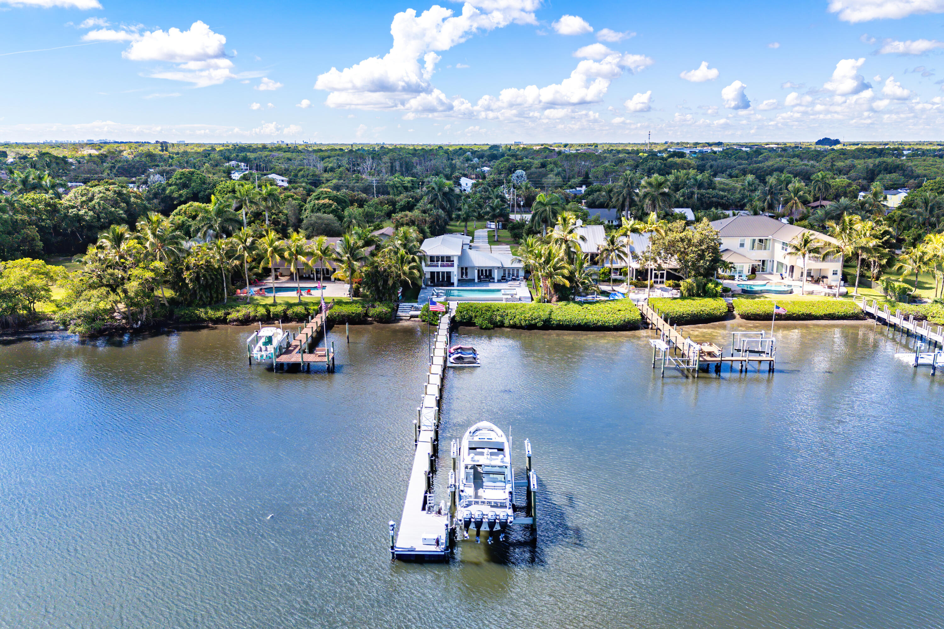 5447 Center Street Jupiter, FL 33458 - Photo 52 of 60 a view of a lake with a car parked
