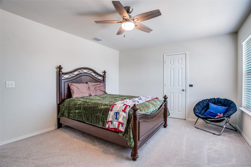 809 Indigo Road Princeton, TX 75407 - Photo 17 of 25 Second bedroom upstairs