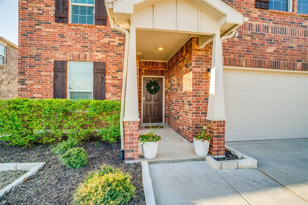 809 Indigo Road Princeton, TX 75407 - Photo 2 of 25 New stone work for that extra curb appeal