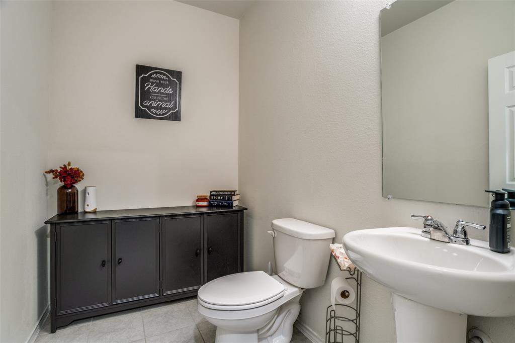 809 Indigo Road Princeton, TX 75407 - Photo 10 of 25 Half bath downstairs