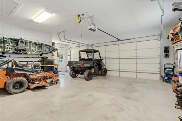 a view of washer and dryer with kitchen in the background