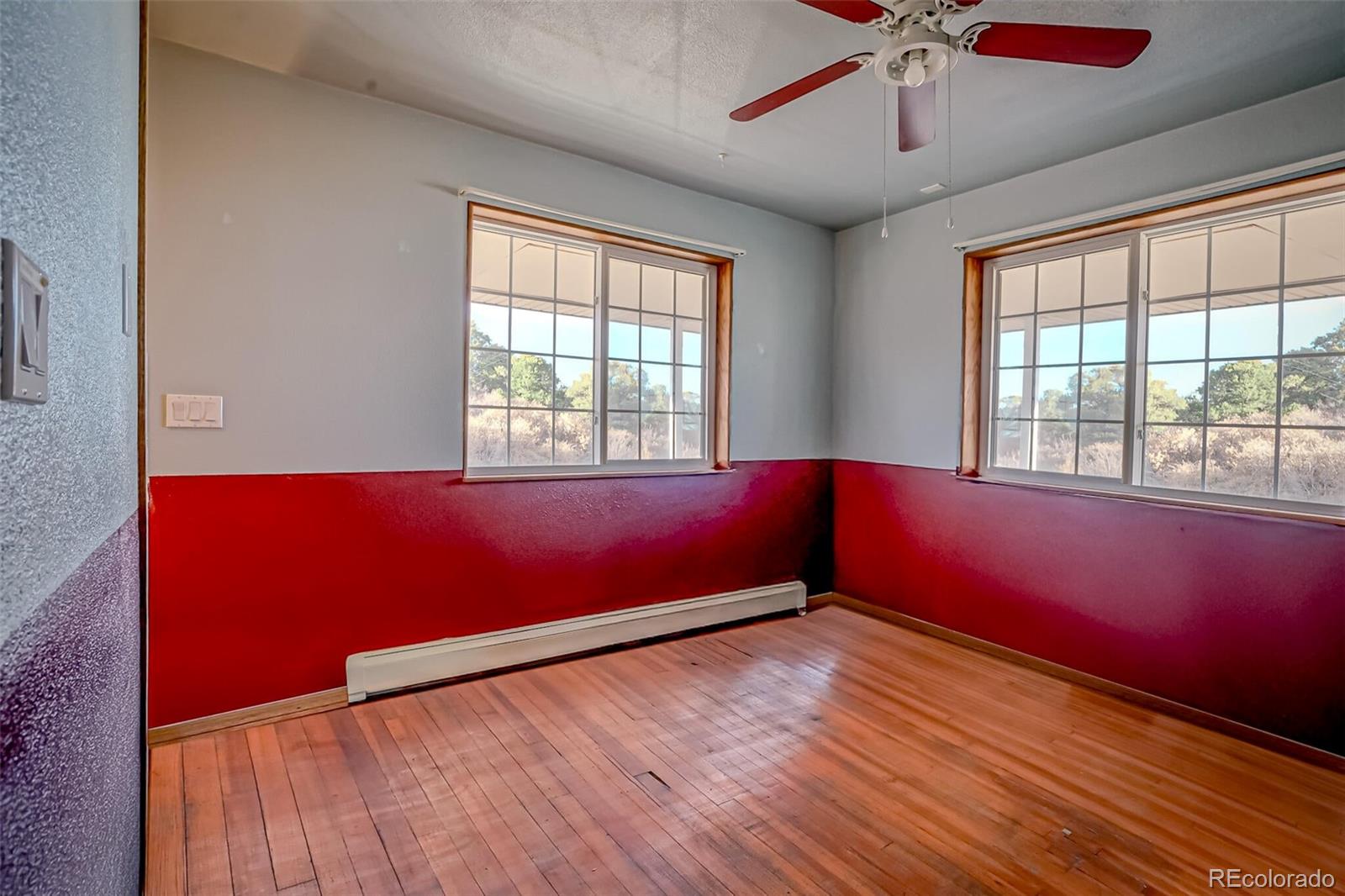 20722 Tollerburg Road Trinidad, CO 81082 - Photo 16 of 31 a big room with wooden floor and windows