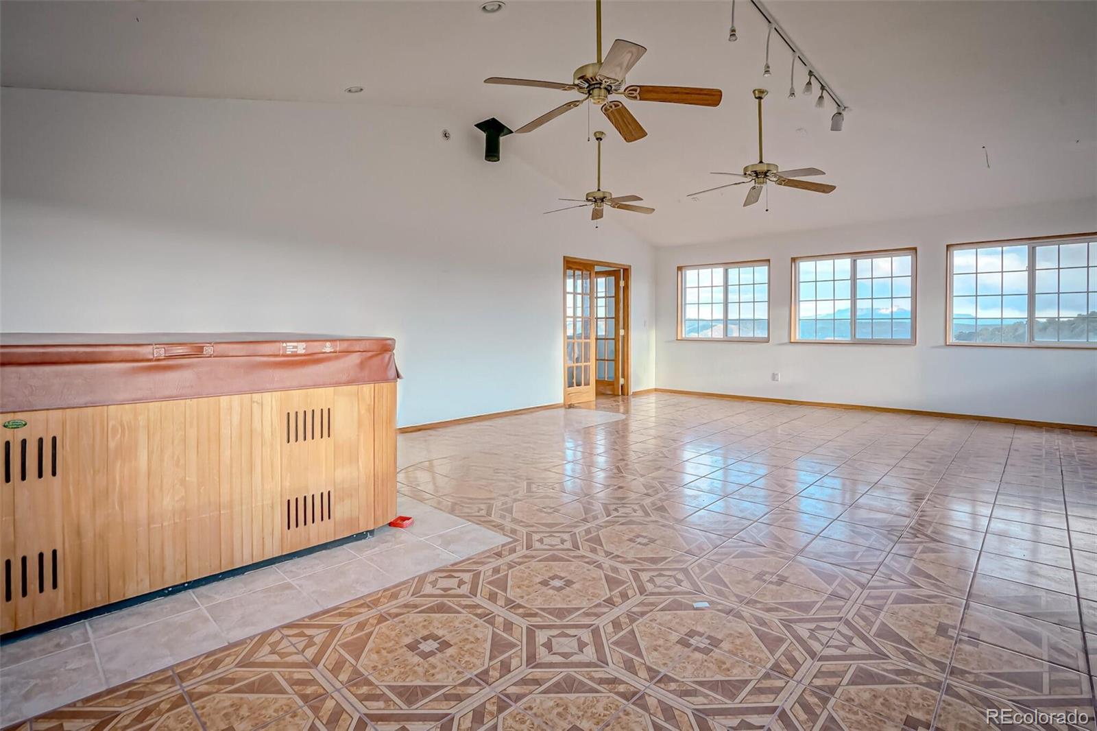 20722 Tollerburg Road Trinidad, CO 81082 - Photo 23 of 31 a view of empty room with wooden floor and fan