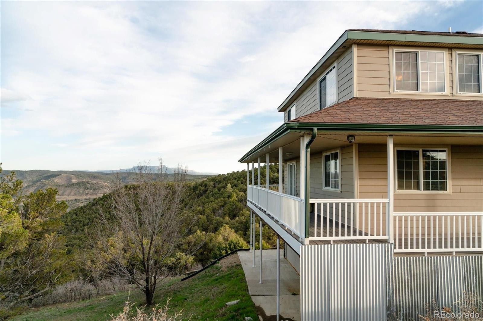 20722 Tollerburg Road Trinidad, CO 81082 - Photo 27 of 31 a front view of a house with balcony