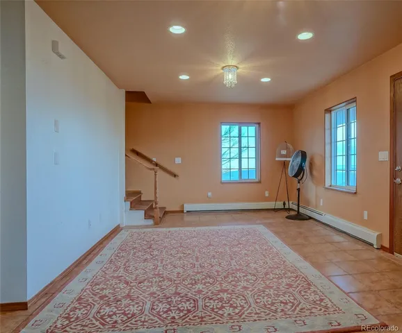 a view of empty room with a window