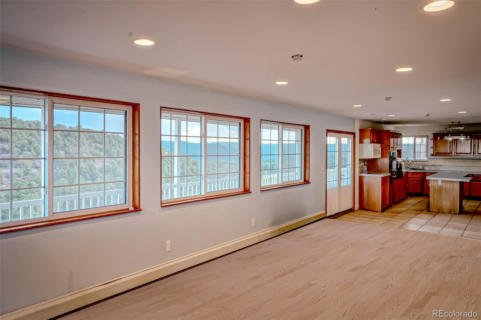 20722 Tollerburg Road Trinidad, CO 81082 - Photo 9 of 31 a living room with furniture and large windows