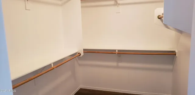 a bathroom with 2 sink and a mirror