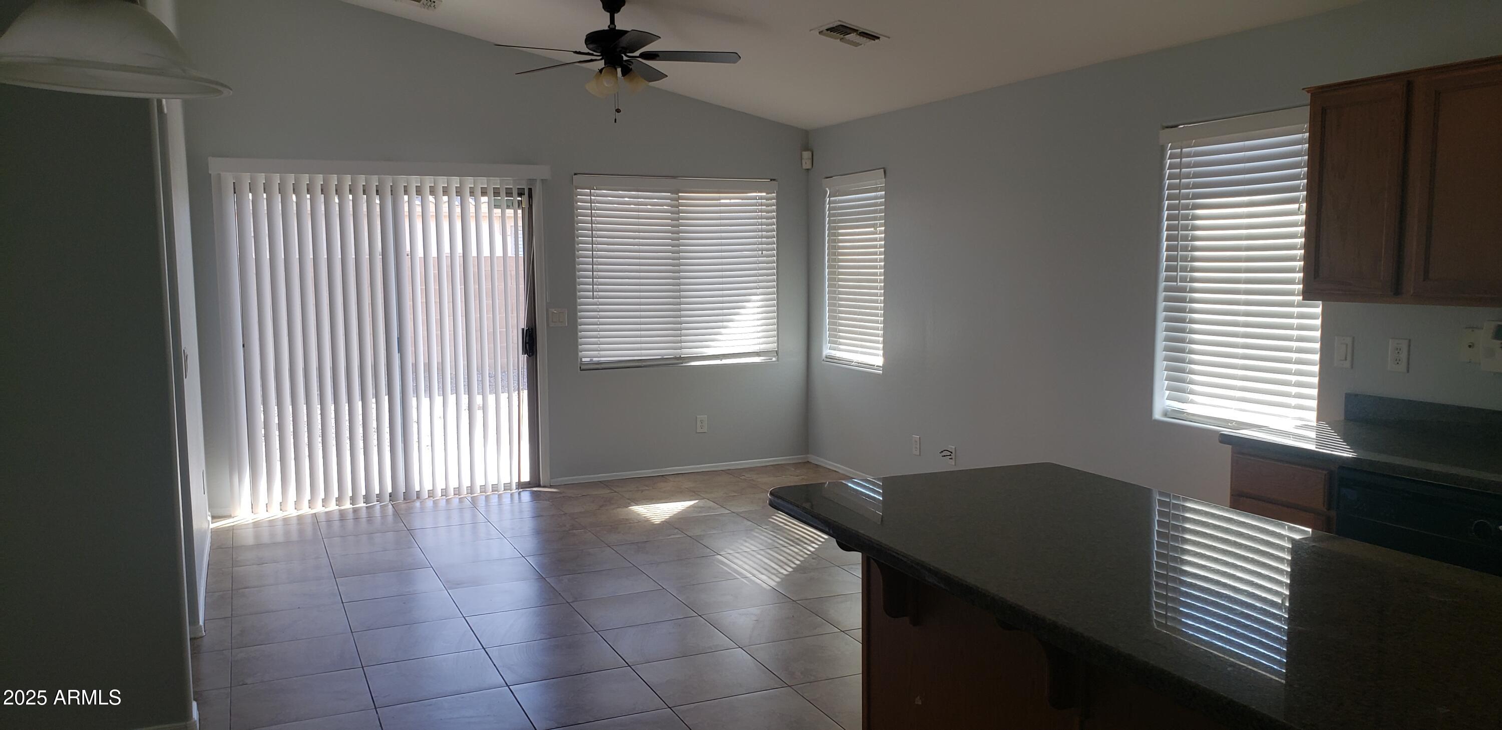 4631 West Shumway Farm Road Laveen, AZ 85339 - Photo 2 of 16 a view of an empty room with a window