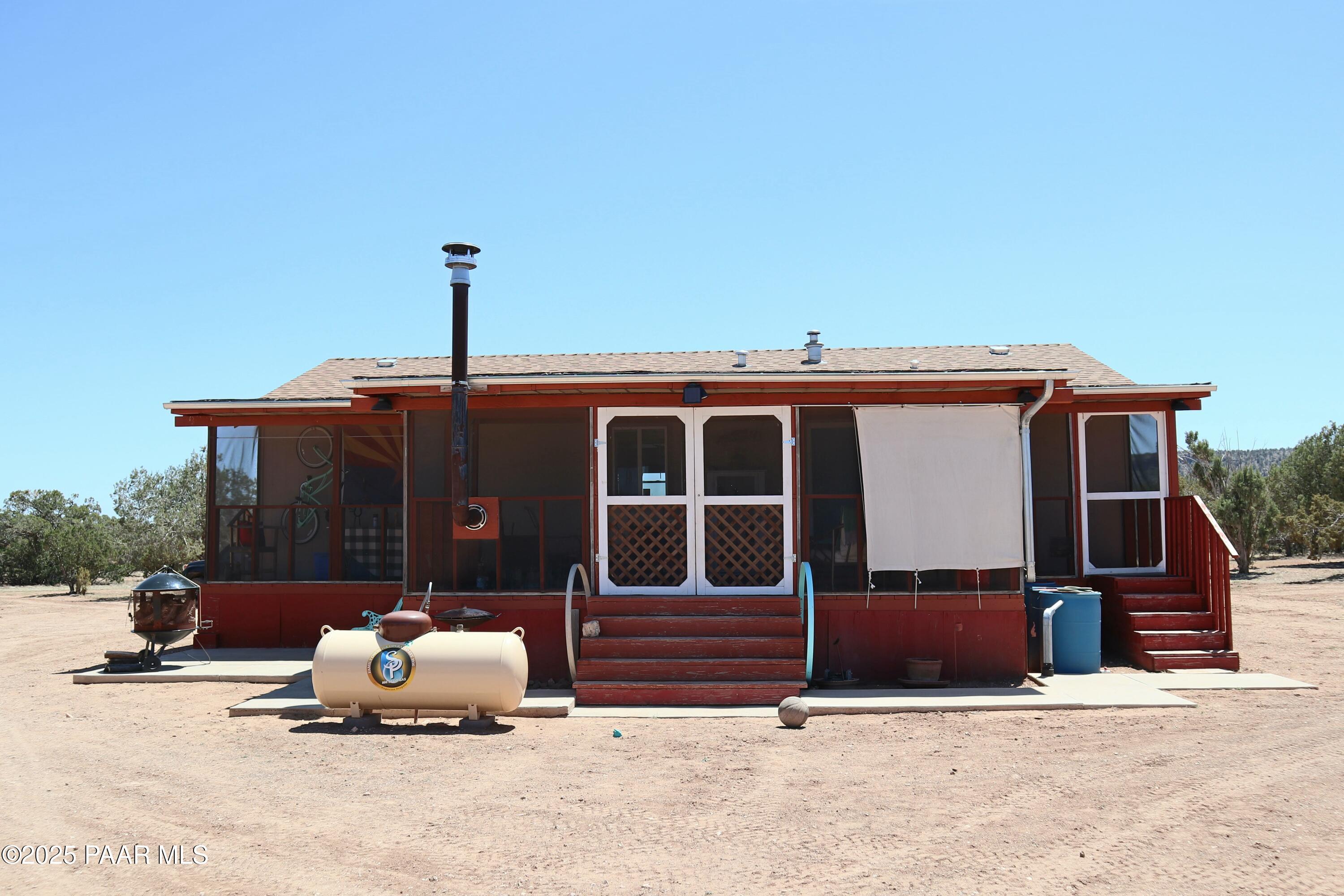 8850 West Fountain Ranch Road Ash Fork, AZ 86320 - Photo 18 of 29 a house view with a outdoor seating space