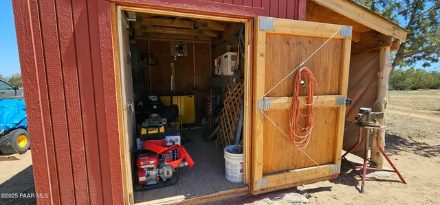 a backyard of a house with yard and mountain view in the back