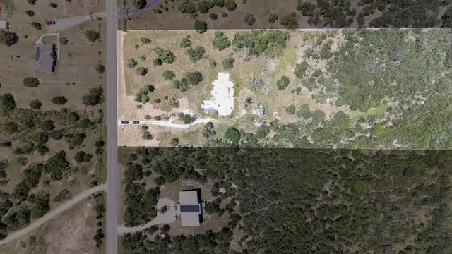 view of a house with a trees