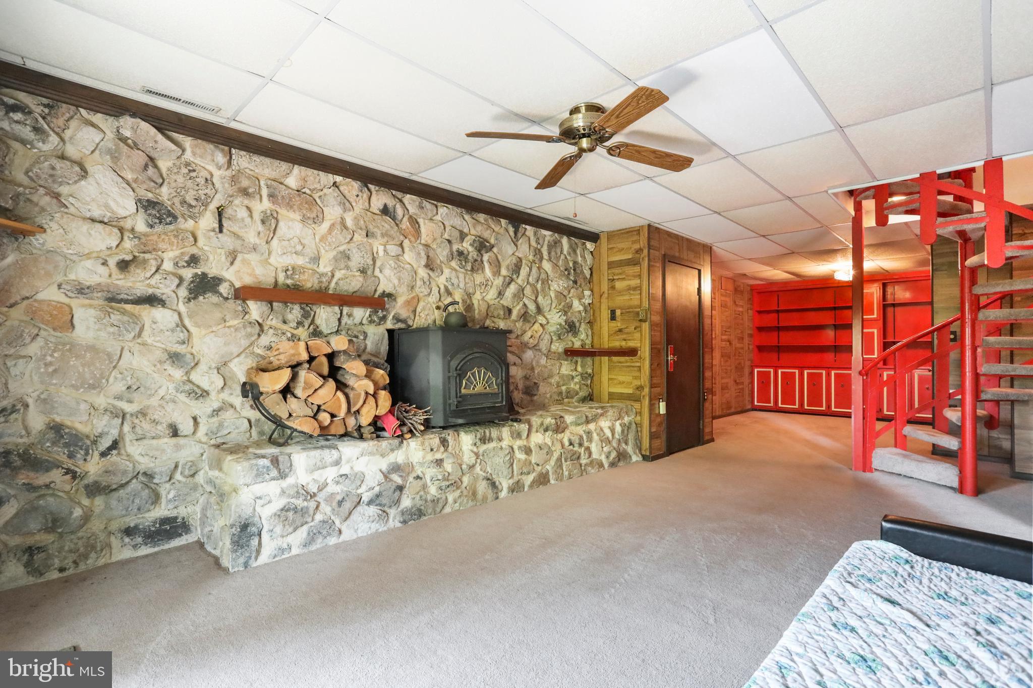 14 Martin Road Front Royal, VA 22630 - Photo 47 of 52 Lower level den with wood stove