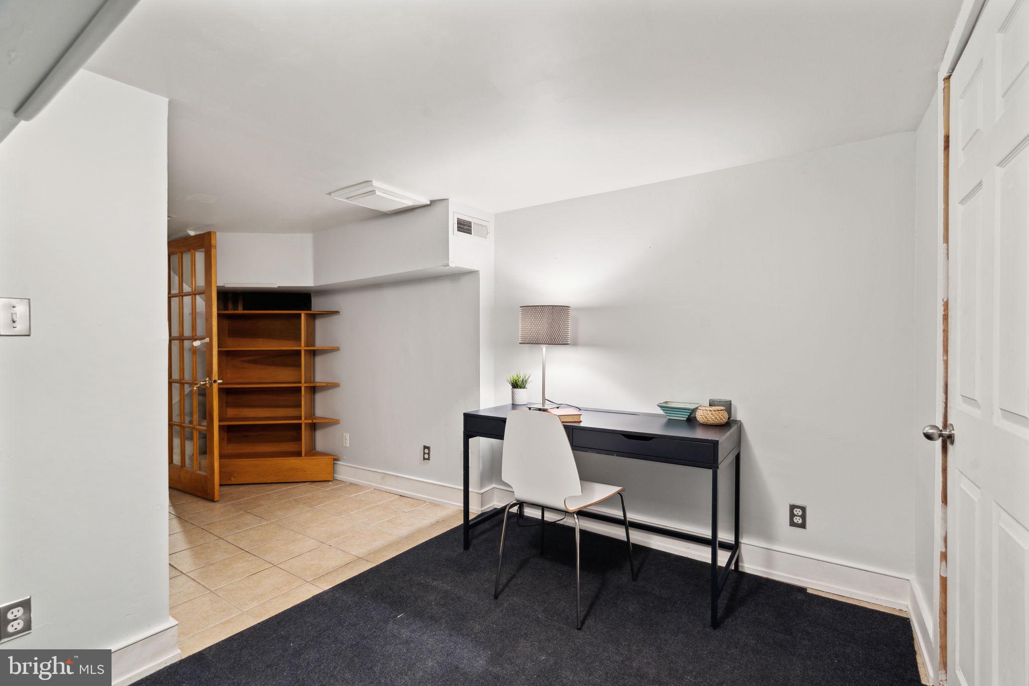 2206 Wallace Street Philadelphia, PA 19130 - Photo 19 of 38 a view of a workspace with furniture