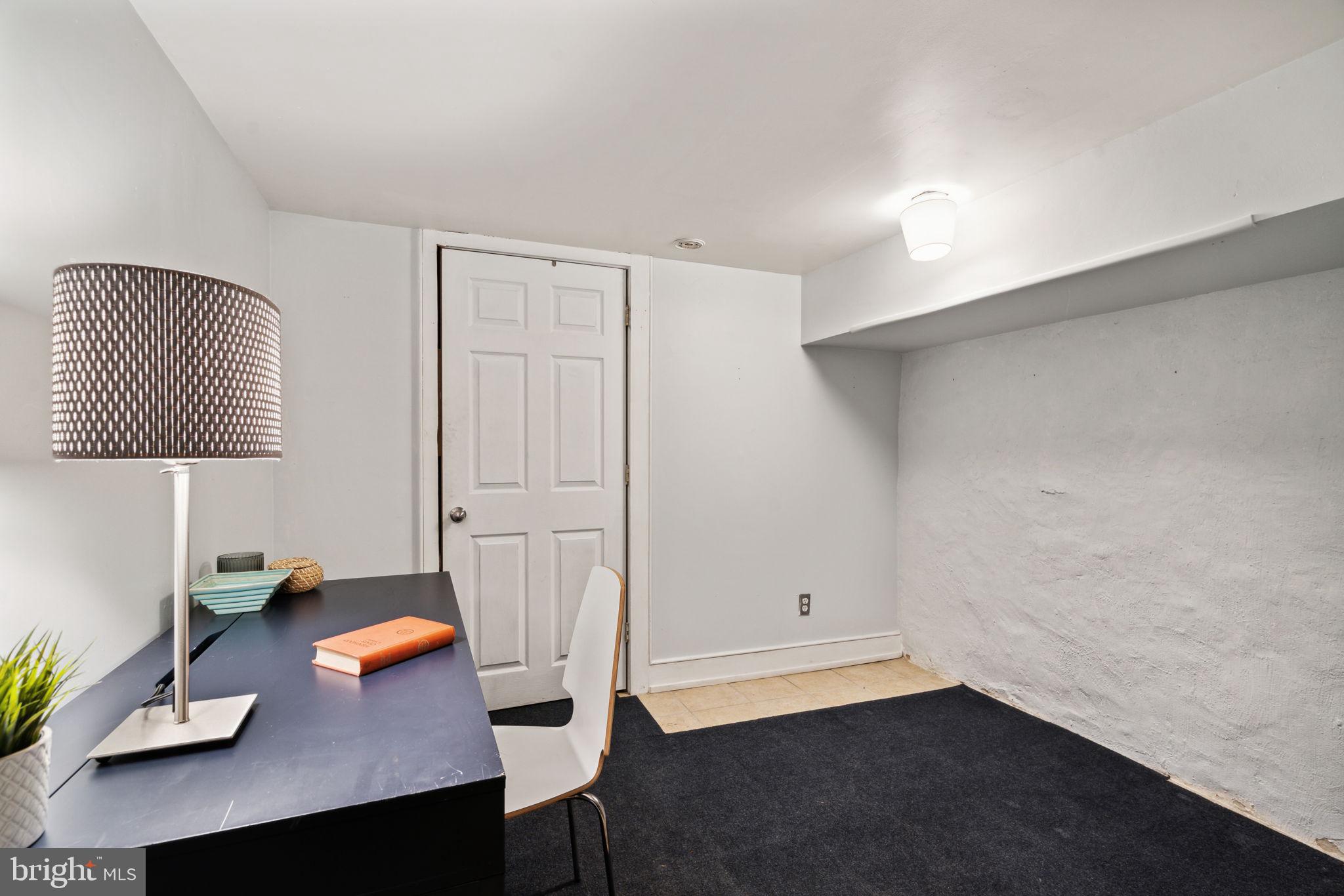 2206 Wallace Street Philadelphia, PA 19130 - Photo 20 of 38 a view of workspace with a couch