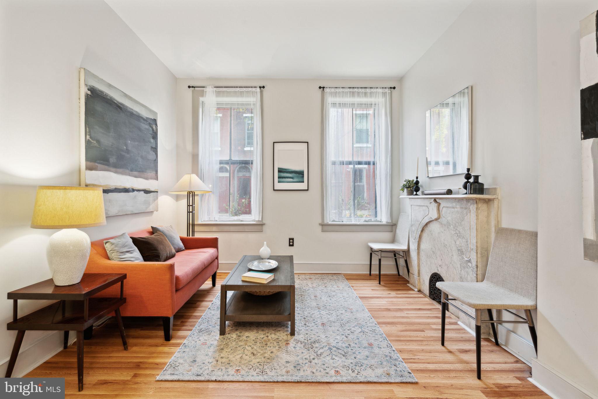 2206 Wallace Street Philadelphia, PA 19130 - Photo 2 of 38 a living room with furniture and wooden floor