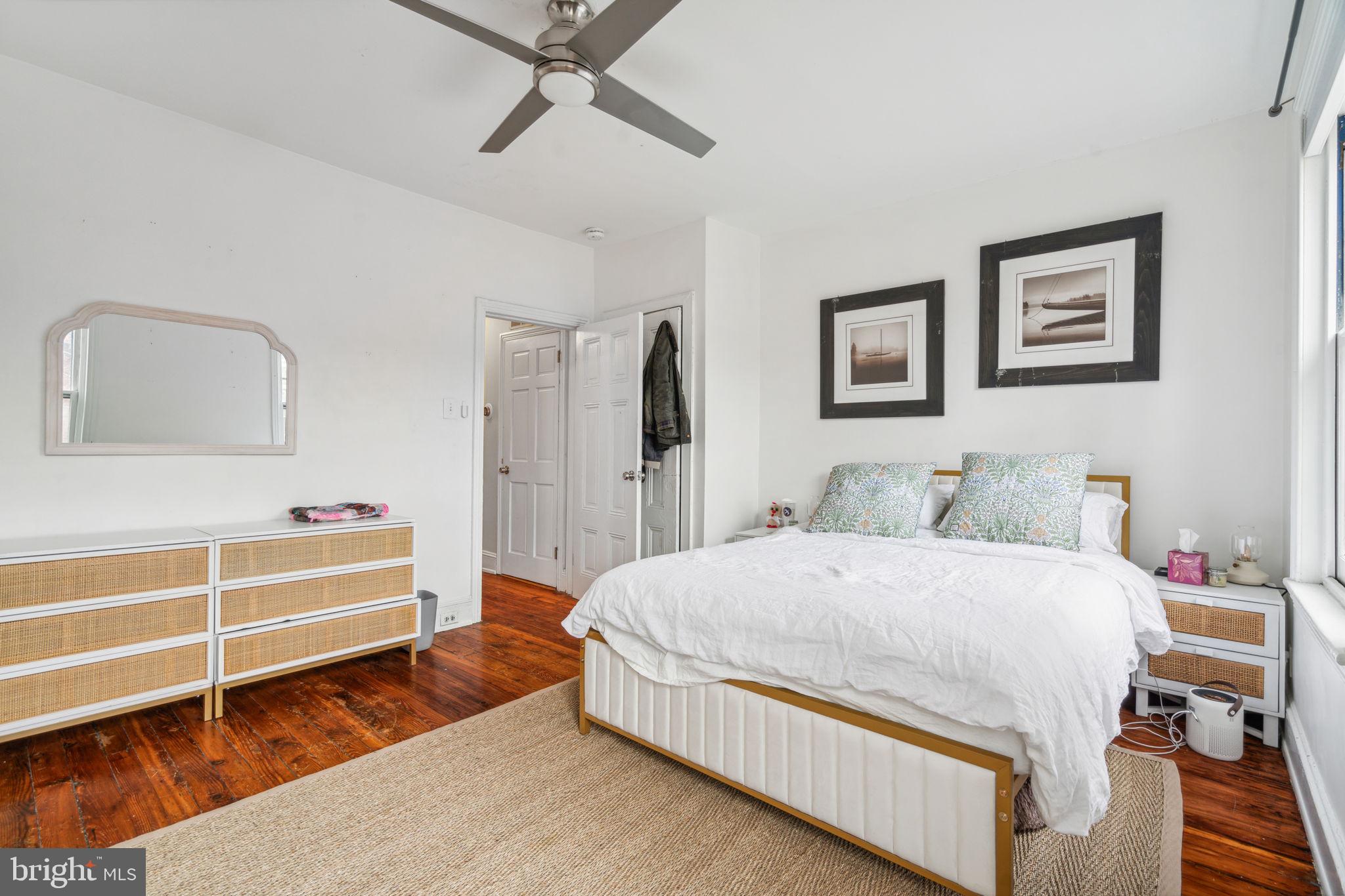 2206 Wallace Street Philadelphia, PA 19130 - Photo 33 of 38 a spacious bedroom with a bed and a dresser