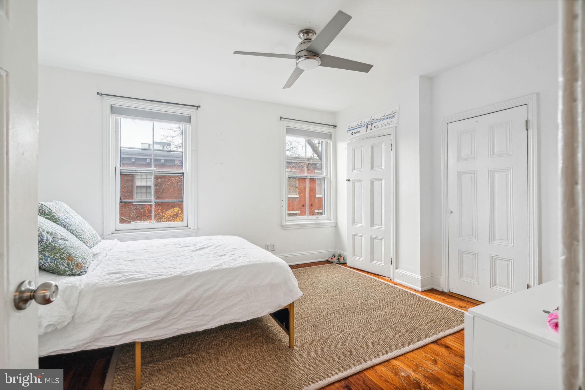 2206 Wallace Street Philadelphia, PA 19130 - Photo 34 of 38 a bedroom with a bed and a window