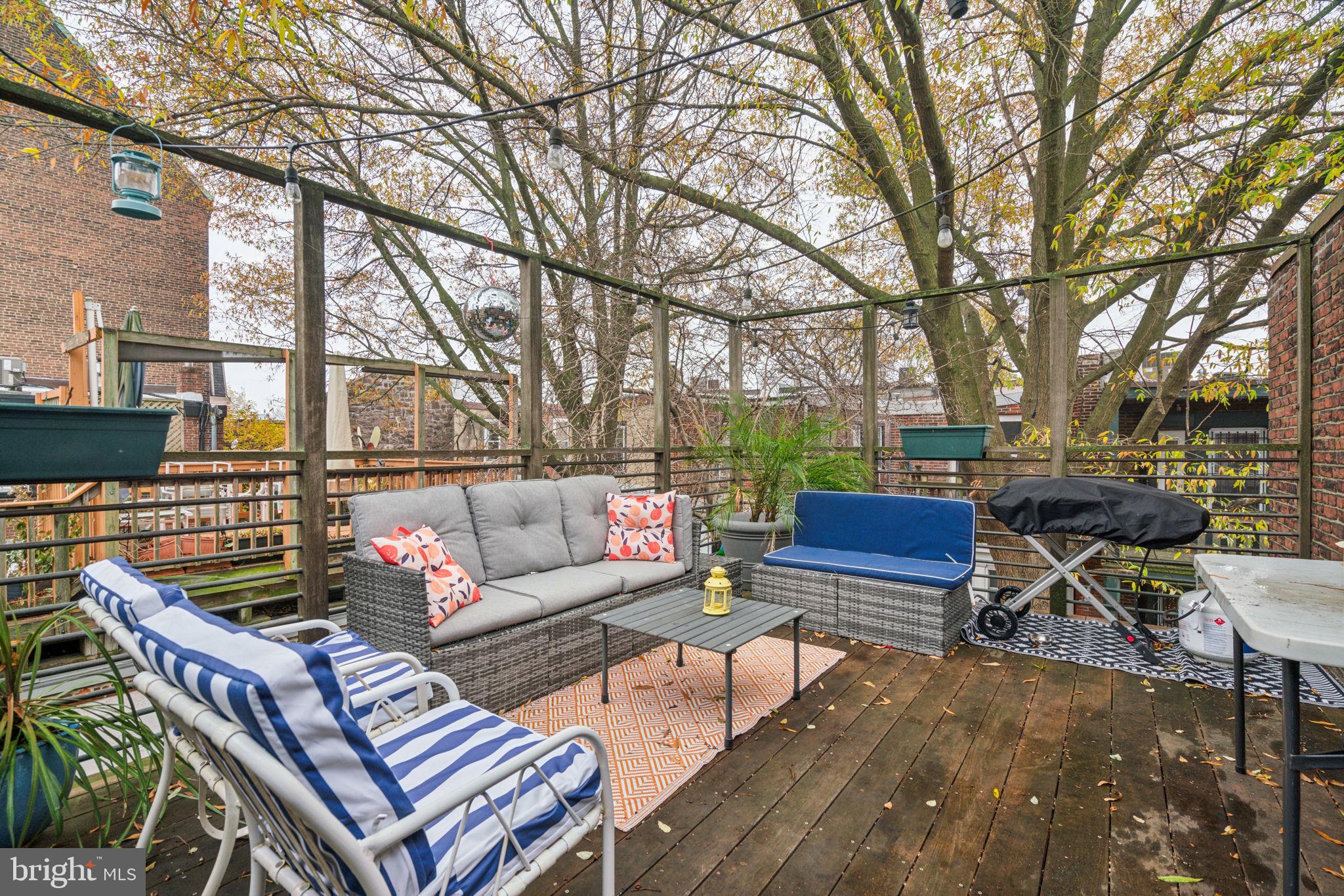 2206 Wallace Street Philadelphia, PA 19130 - Photo 37 of 38 a outdoor living space with patio furniture and a potted plant