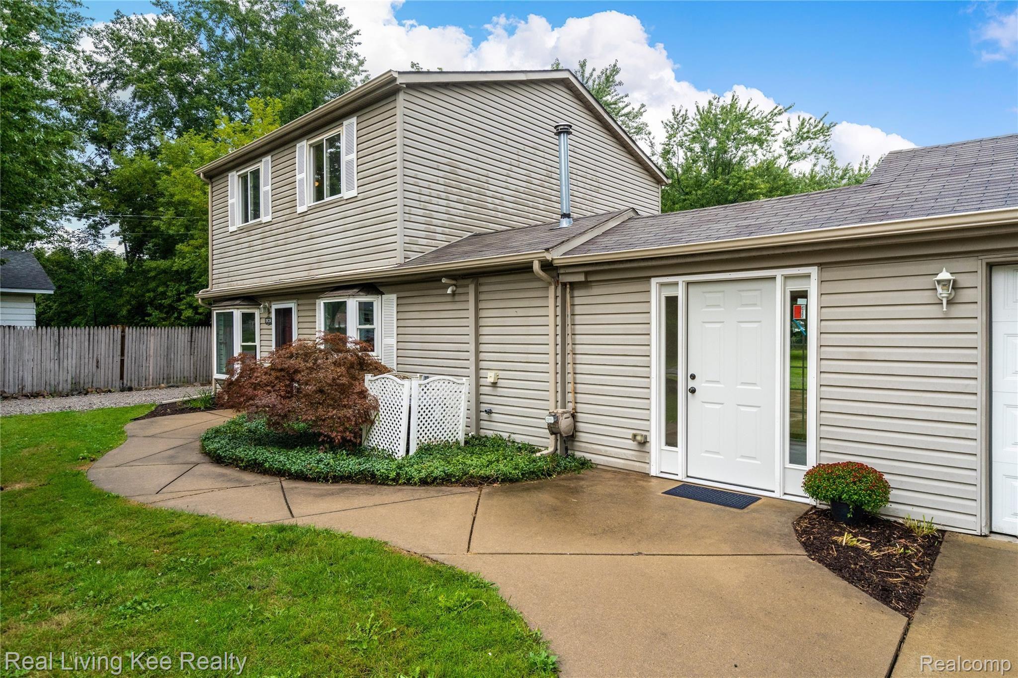 1928 Tamm Avenue Rochester, MI 48309 - Photo 2 of 41 Walkway leads to Front Door & Brand-New Door into Breezeway