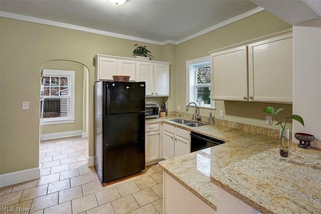 3041 Yorkshire Road Cleveland, OH 44118 - Photo 12 of 25 Ample granite counters and a mudroom beyond that can function as a pantry, too.