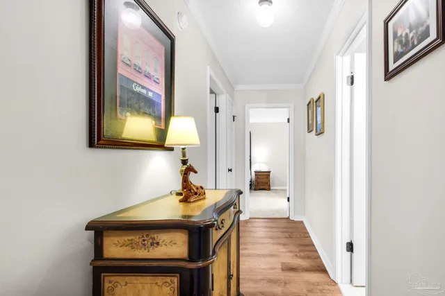 a bedroom with a bed and a table