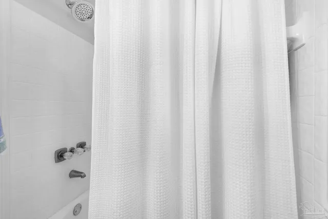 a bed room with a bed and a couch