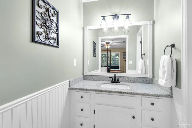 a view of a building with a yard and sitting area