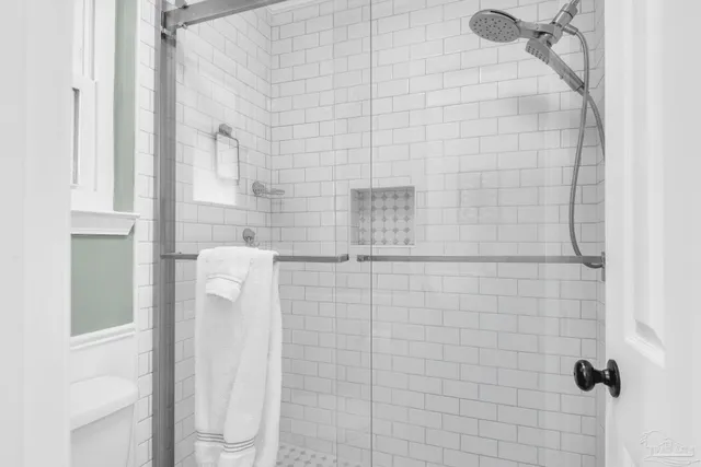 an aerial view of a house with a garden