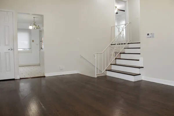 a view of entryway with wooden floor