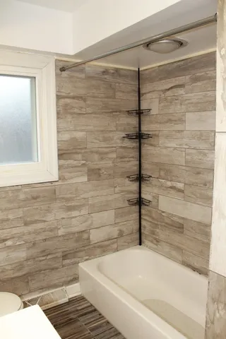 a bathroom with a bathtub