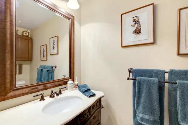 a bathroom with a sink and a mirror