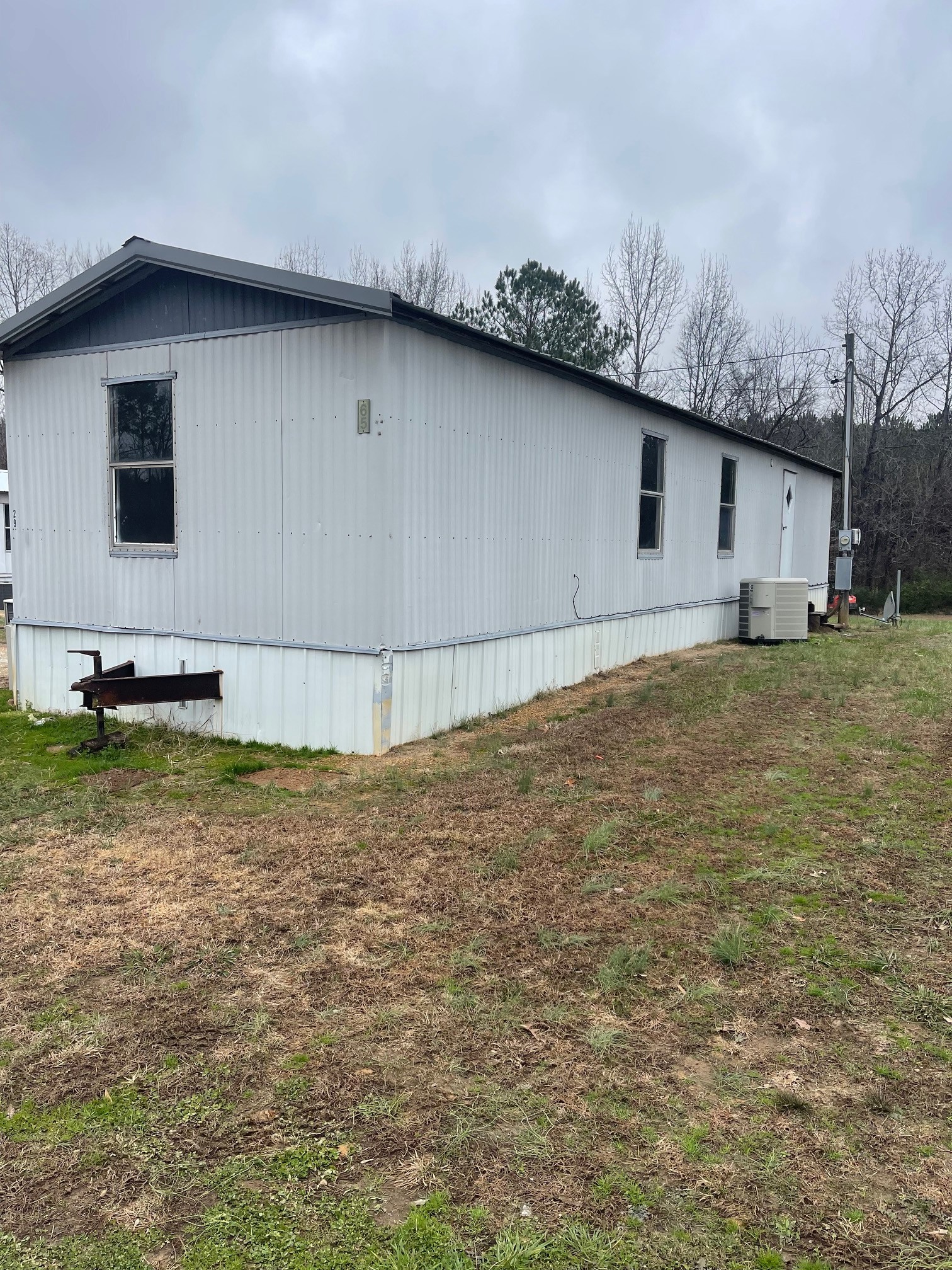 a house with yard in front of it