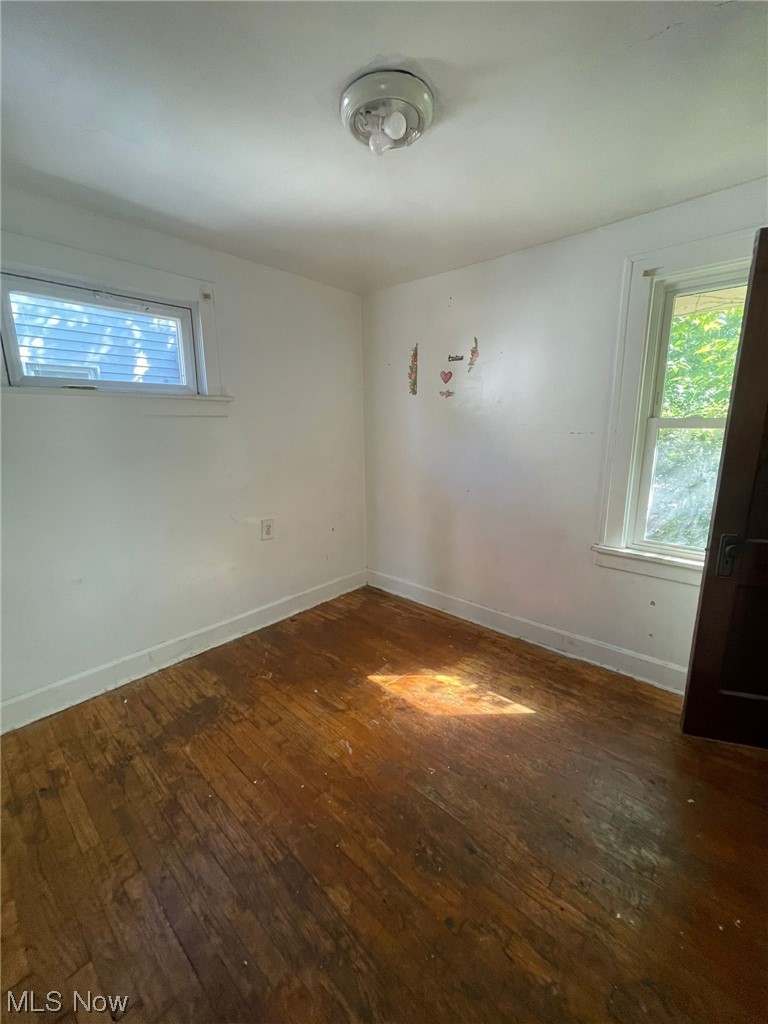 1493 Larchmont Road Cleveland, OH 44110 - Photo 18 of 30 View of hardwood floored empty room