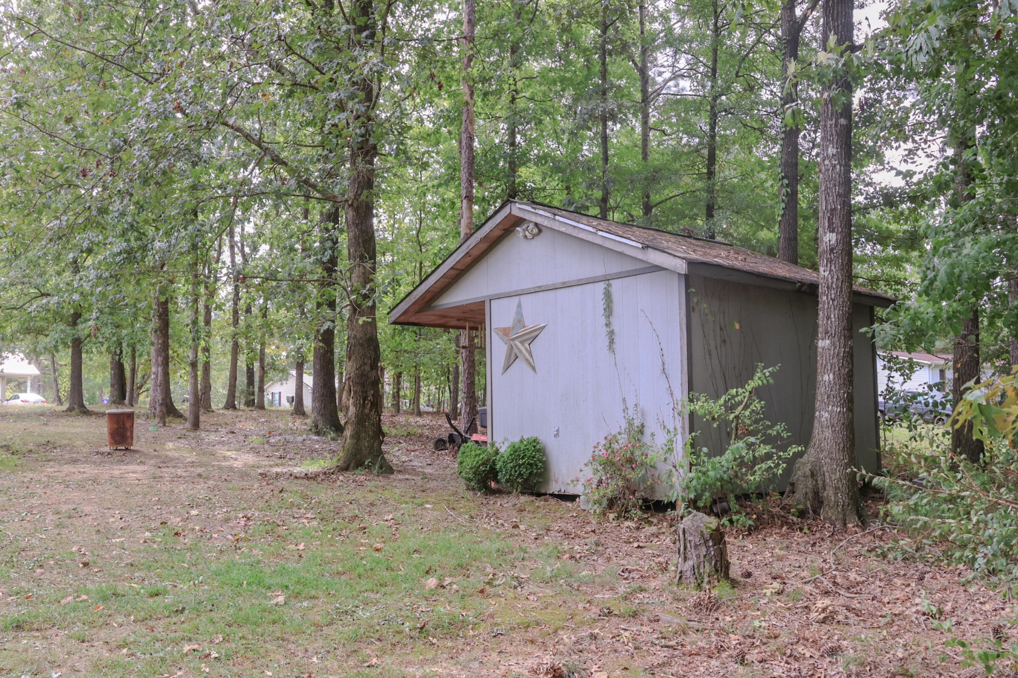 1972 Southeast Hunt Road Cleveland, TN 37323 - Photo 23 of 25 a front view of a house with garden