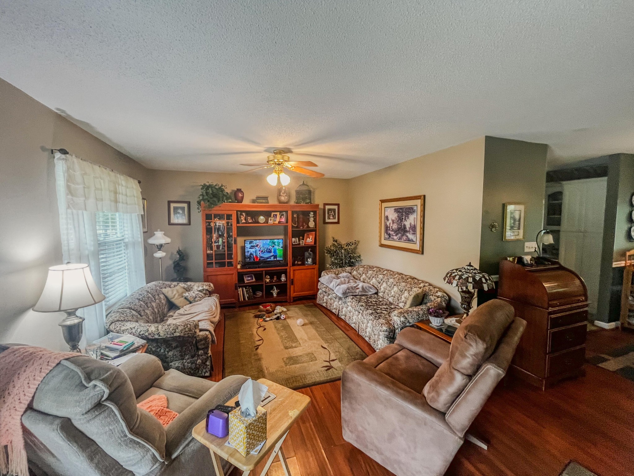1972 Southeast Hunt Road Cleveland, TN 37323 - Photo 3 of 25 a living room with furniture and a flat screen tv