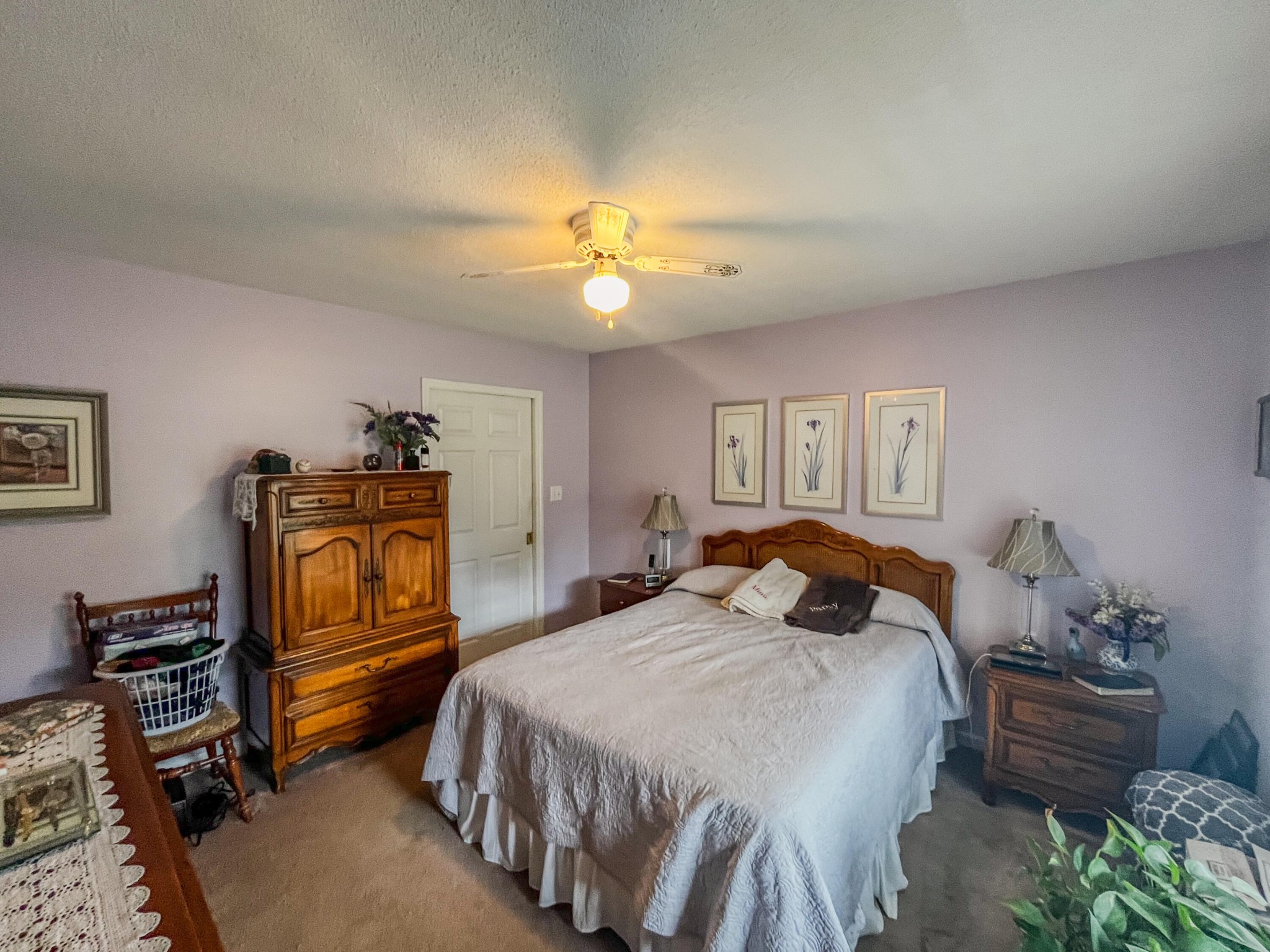 1972 Southeast Hunt Road Cleveland, TN 37323 - Photo 10 of 25 a bedroom with a bed and a chandelier