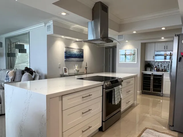 a kitchen with a sink and stove