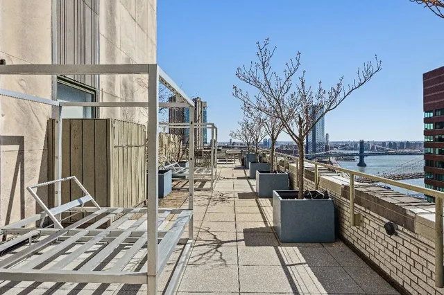 a view of a chairs and tables on the terrace