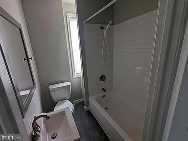 3175 Tulip Street Philadelphia, PA 19134 - Photo 3 of 12 a bathroom with a tub and toilet
