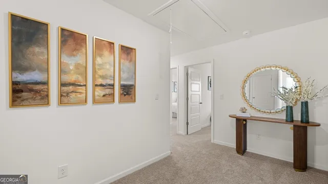 a view of room with window and wooden floor