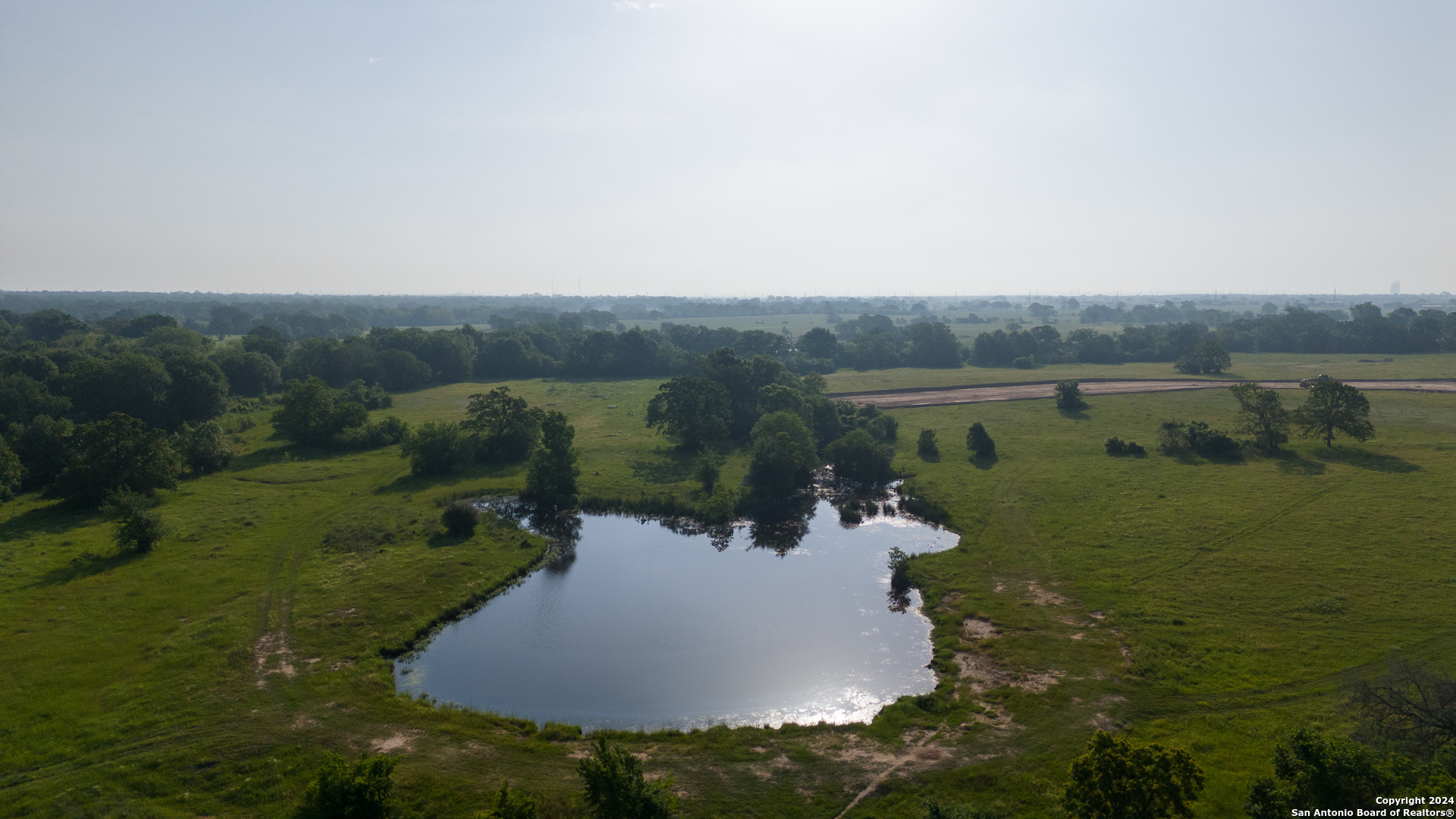 Lot 38 Panther Ridge Drive Iola, TX 77861 - Photo 25 of 33 a view of a lake with a yard