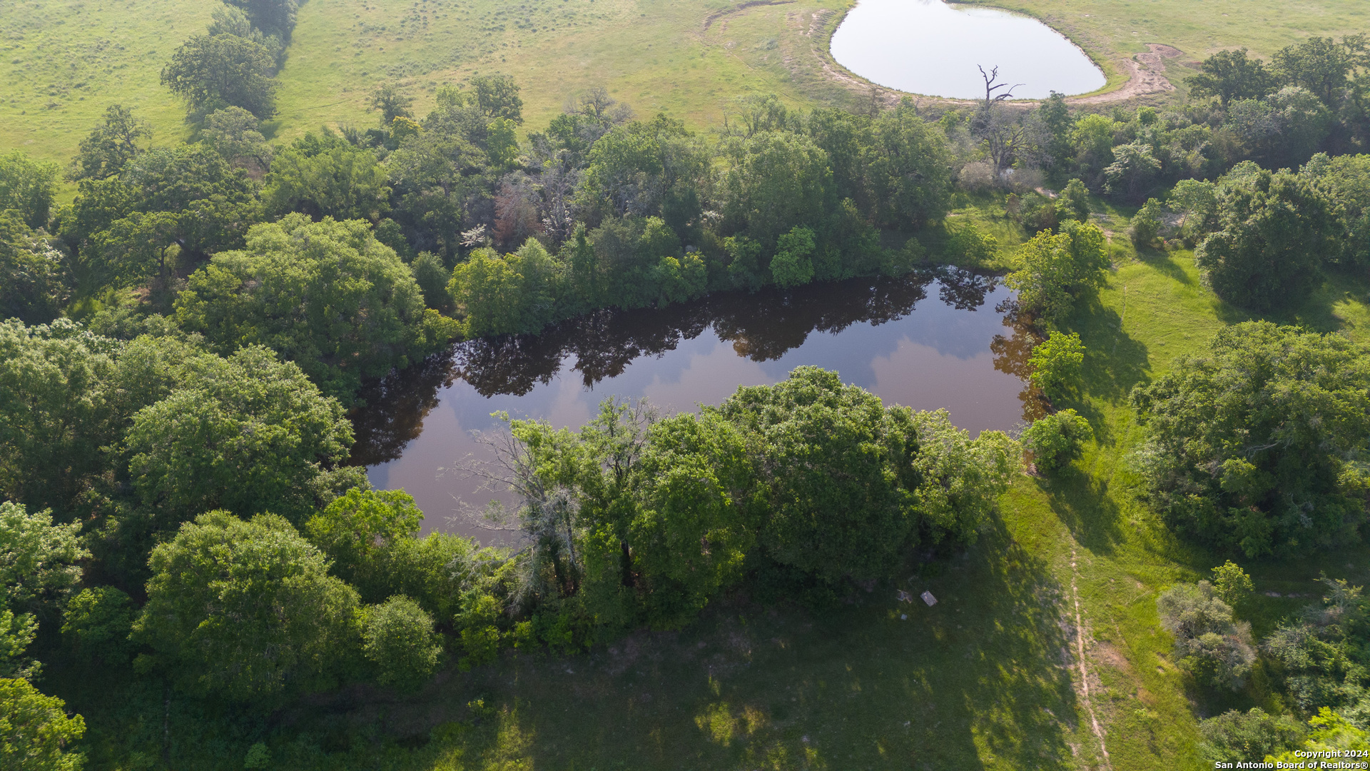 Lot 38 Panther Ridge Drive Iola, TX 77861 - Photo 26 of 33 an aerial view of a house with pool yard outdoor seating and yard