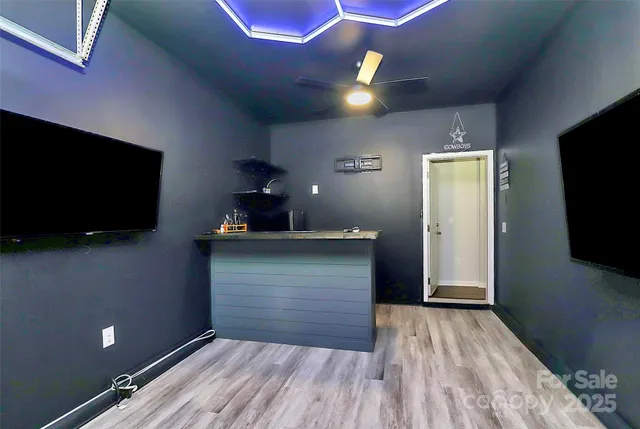 a view of a livingroom with a flat screen tv