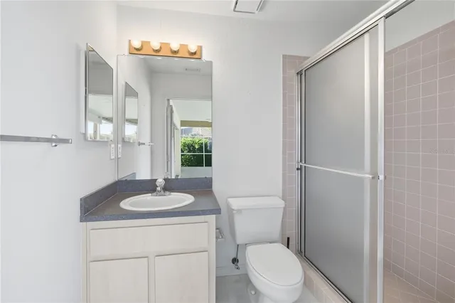 a view of a house with backyard and garden