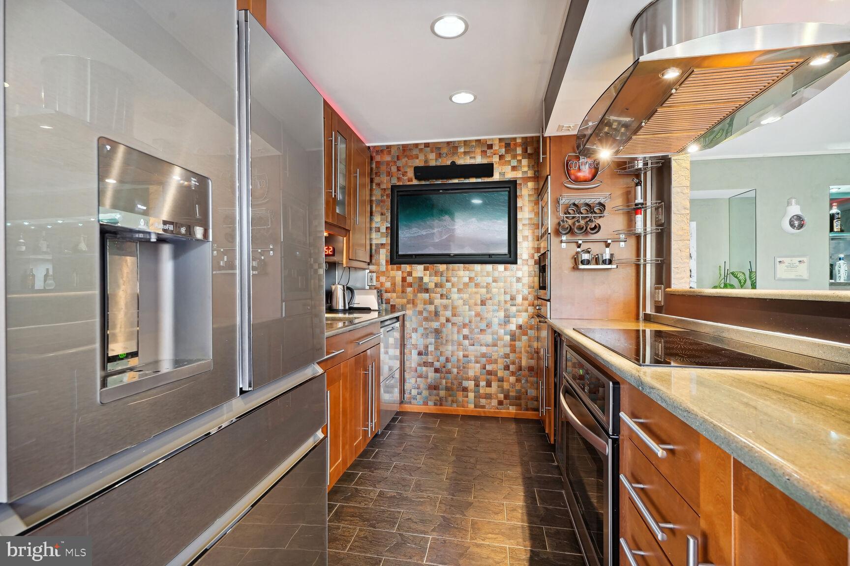 9701 Fields Road, Unit 201 Gaithersburg, MD 20878 - Photo 15 of 68 Top of the line modern kitchen appliances